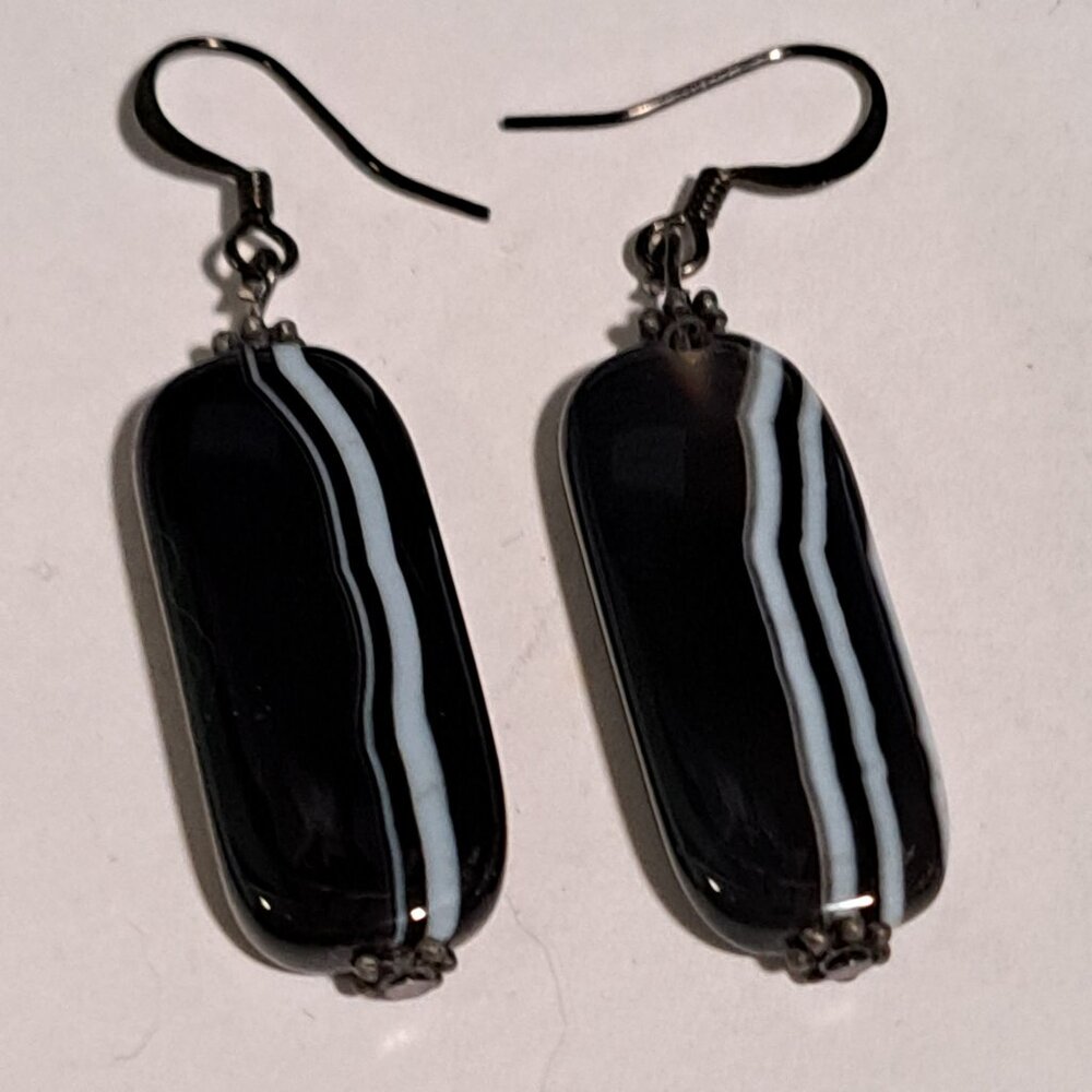 black and white flat stone type earrings